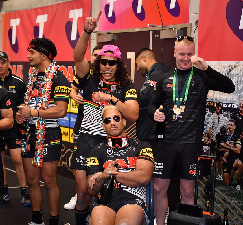 Jarome Luai and Viliame Kikau celebrate their 2022 NRL grand final victory.