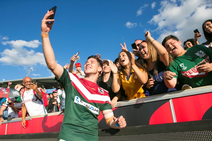 Mitchell Moses with fans during the 2017 Rugby League World Cup.