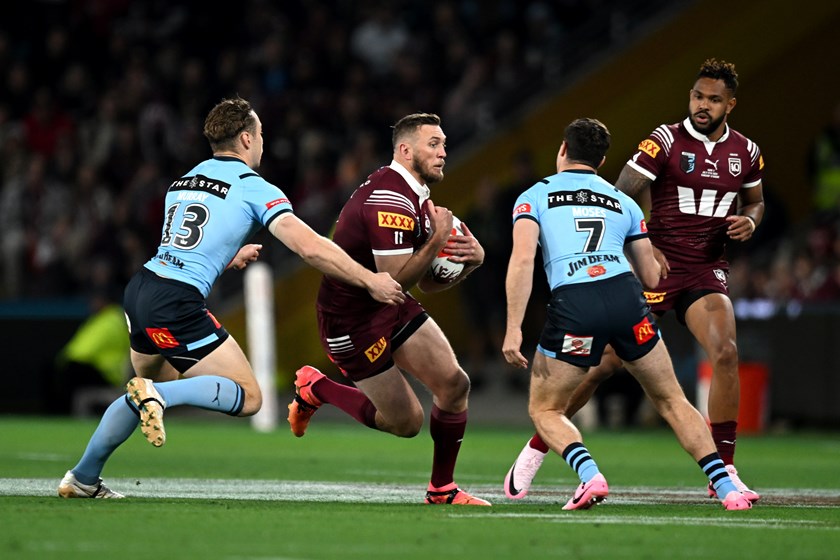 Kurt Capewell takes the ball up for the Maroons.